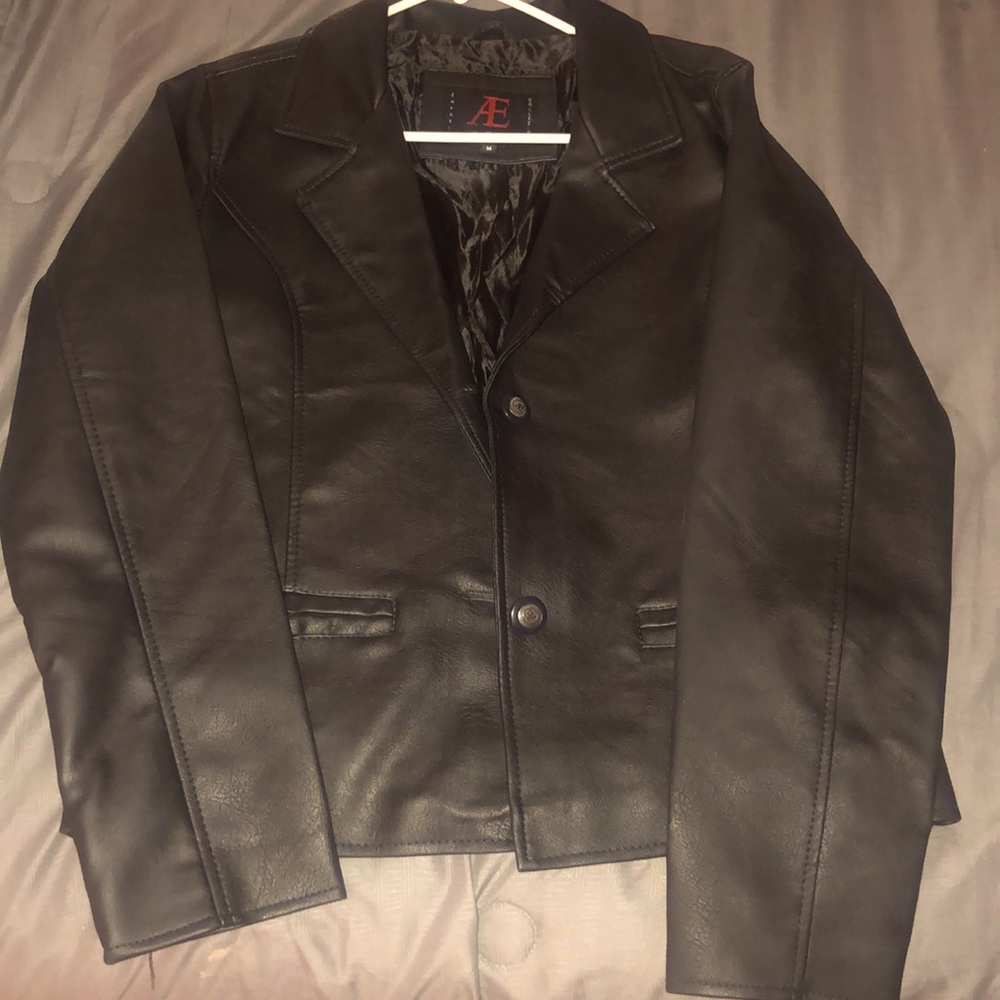 size medium leather jacket with two front pockets